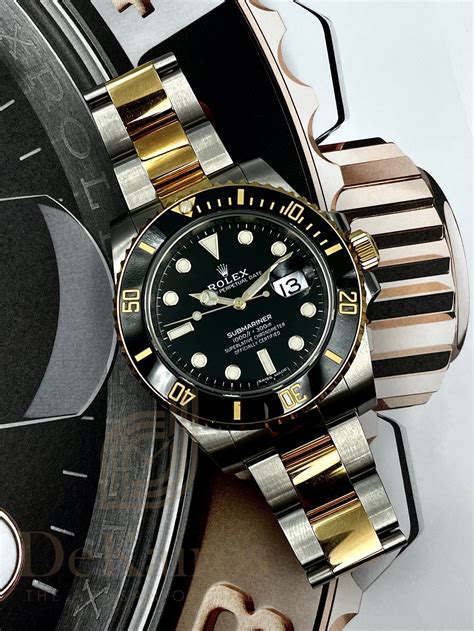 rolex submariner black and gold how much weight in gold|rolex submariner list price.